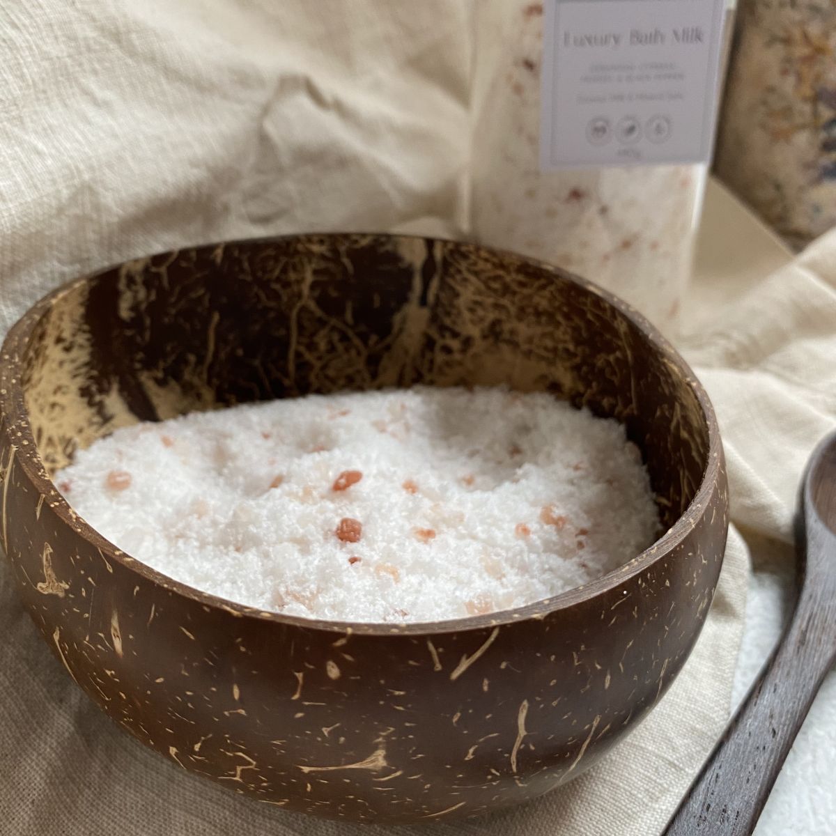 White & Pink Bath Salts & Milk in coconut bowl