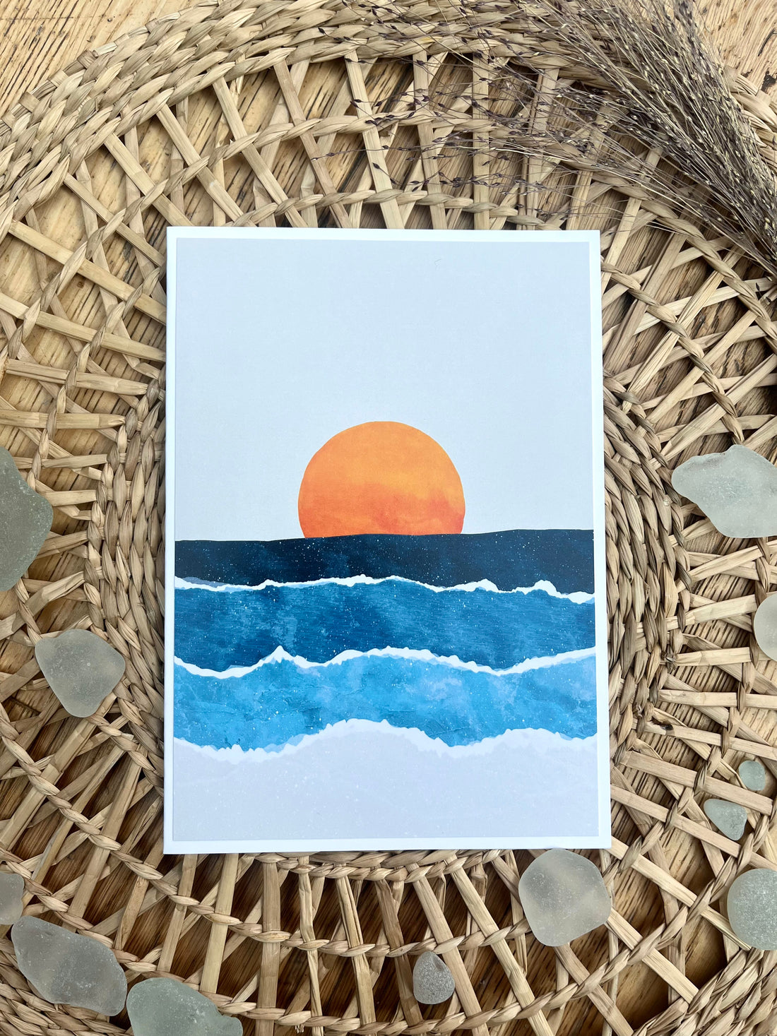 Hand illustrated Card with Orange Sunrise over 4 tone blue sea